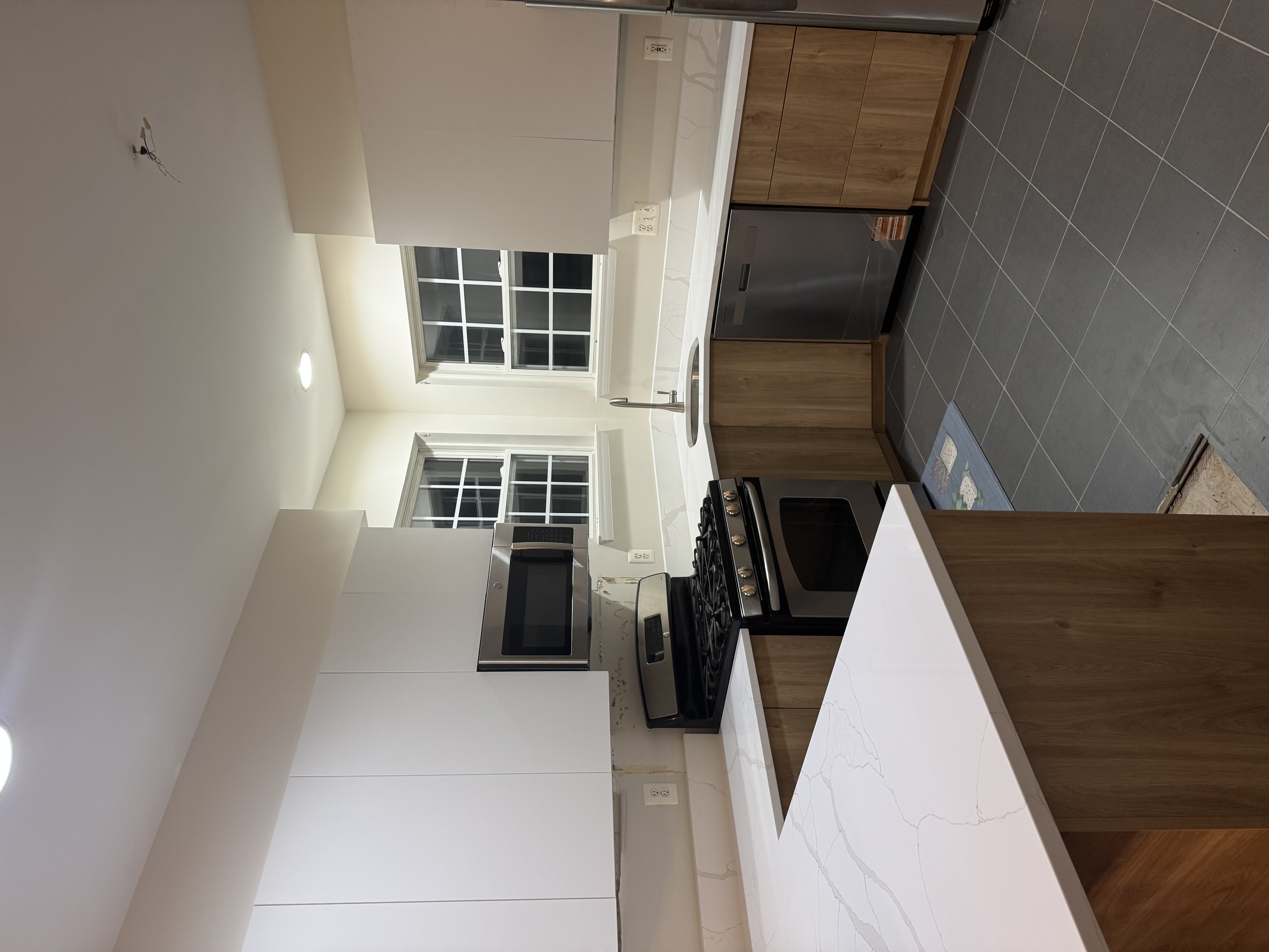 Modern Frameless Custom Cabinets with Calacatta Michelangelo Quartz Project - Premium product showcase